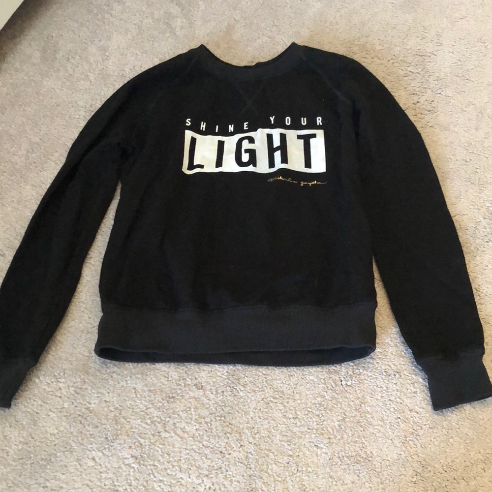 Sweatshirt that says “shine your light”